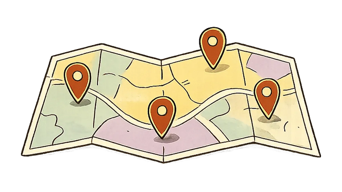 Ein gefalteter Papierstadtplan mit vier Kartennadeln darin.